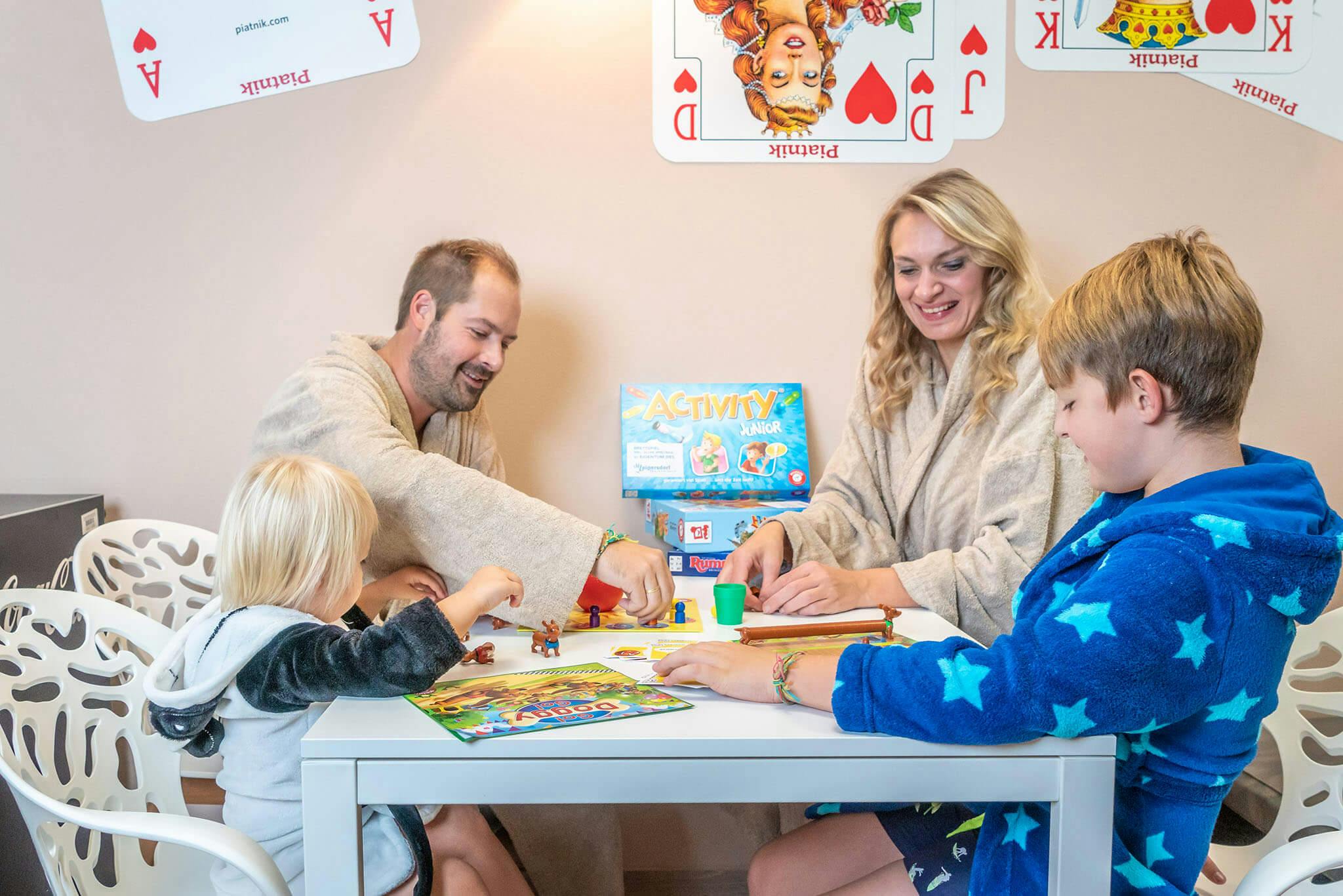 A family plays board games.