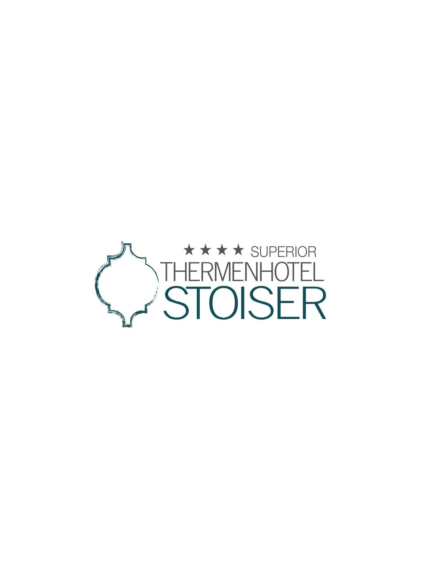 Logo of the Stoiser Thermal Hotel with four stars and the words ‘SUPERIOR THERMENHOTEL STOISER’.