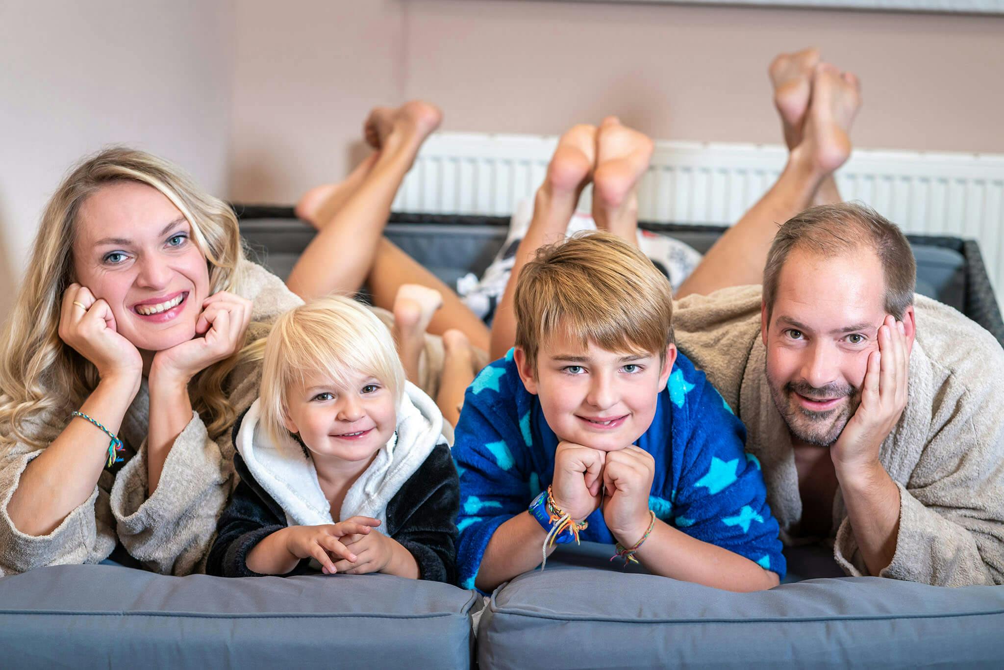 A happy family enjoys their time in the family suite.